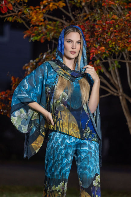 Artist Sheri Dougherty creates exuberant fashion inspired by travel, light and adventure.