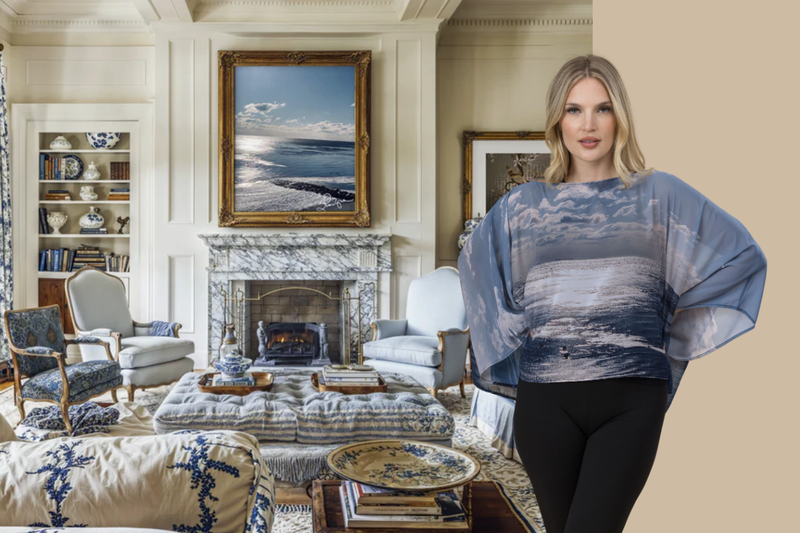 Classic room with an art print of "Birds at Sunrise" on the wall behind a woman wearing the print shawl