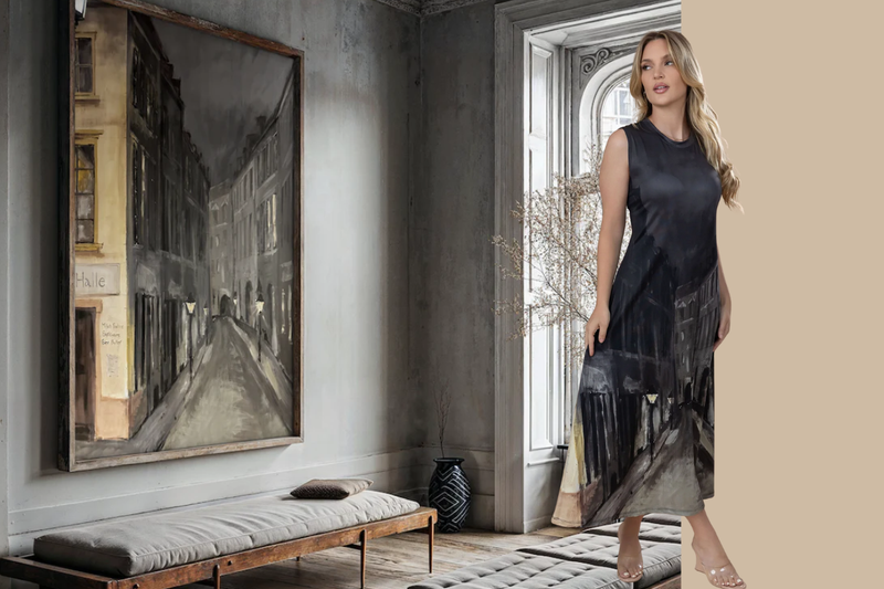 Room with a "Tunnel of Love" art print on the wall behind a woman wearing that print on her dress